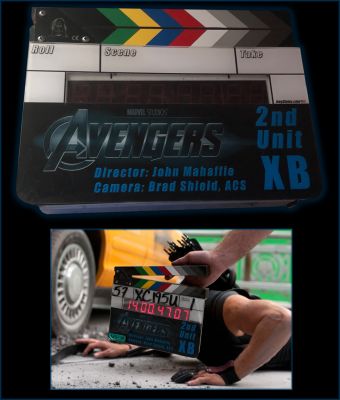 Clapperboard
Earth's mightiest heroes must come together and learn to fight as a team if they are going to stop the mischievous Loki and his alien army from enslaving humanity. From the 2012 Marvel film The Avengers, this is a production used digital clapperboard. Most digital clapperboards have the back removed and reused, but this clapper is complete and would still be operational when connected to a power source. A clapperboard is a device used in film making and video production to assist in synchronizing of picture and sound, and to designate and mark the various scenes and takes as they are filmed and audio-recorded.
Keywords: Clapperboard