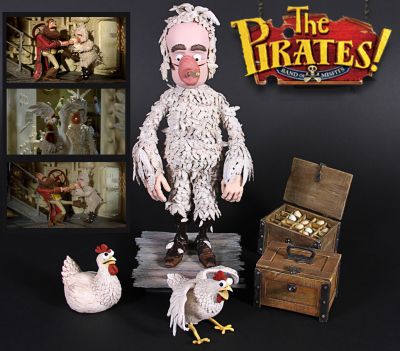 Charles Darwin (David Tennant) Stop-Motion Puppet & Props
A Charles Darwin (David Tennant) stop-motion puppet with props from The Pirates! Band of Misfits. Darwin was seen tarred and feathered on board the QV1 as he attempted to rescue the Pirate Captainâ€™s (Hugh Grant) prize dodo Polly. Built to be posable with an internal metal armature by Aardman, the puppet features a realistic coat of feathers and hands made from silicone, while the top of his head and eyebrows are made in Plasticine. The mouth is a rapid-prototyped resin component designed for quick replacement. Accompanying Darwin are a pair of egg boxes and two chickens, one of which is posed to look as though it is startled. Showing some small marks from use, the puppet and props remain in overall very good condition, with the puppet presented on a custom-made display base. 
Keywords: Charles Darwin (David Tennant) Stop-Motion Puppet & Props
