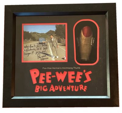 Pee-wee's (Paul Reubens) Hitchhiking Thumb
When eccentric man-child Pee-wee Herman (Paul Reubens) gets his beloved bike stolen in broad daylight, he sets out across the U.S. on the adventure of his life. High visible in Tim Burtonâ€™s 1985 film Pee-weeâ€™s Big Adventure, this is the hitchhiking thumb seen being worn. Pee-wee hitchhikes to Texas, getting rides from a fugitive named Mickey and from Large Marge, the ghost of a deceased truck driver while hitchhiking to the Alamo trying to find his beloved bike.
Keywords: Pee-wee's (Paul Reubens) Hitchhiking Thumb