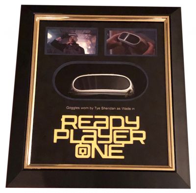 Wade Wattsâ€™ (Tye Sheridan) Goggles
In 2045, much of humanity uses the virtual reality software to escape the desolation of the real world. Orphaned teenager Wade Watts (Tye Sheridan) discovers clues to a hidden game within the program that promises the winner full ownership of the OASIS. From Steven Spielbergâ€™s 2018 film Ready Player One, this is Wade Wattsâ€™ Goggles seen being put on in the film to access the virtual world known as the â€œOasisâ€. The game had a standard immersion rig given to all new OASIS users, and this type of virtual reality goggles can be seen during the first half of the film before Wade is able to upgrade to the newer style.
Keywords: Wade Wattsâ€™ (Tye Sheridan) Goggles