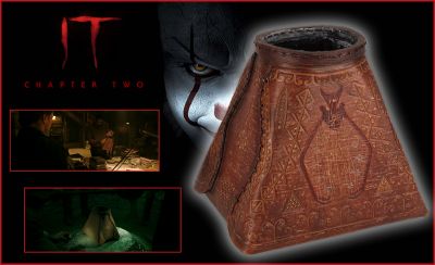 Ritual of Chud Artifact
A Ritual of ChuÌˆd artifact from Andy Muschietti's 2019 horror sequel, It: Chapter Two. The Losers tried to use the artifact to contain â€œItâ€ during the Ritual of ChuÌˆd, but Mike (Isaiah Mustafa) had scratched off the diagram showing that the previously attempted ritual had failed. The artifact is made of brown leather sections stitched together with leather string, and has images and patterns engraved upon it. One side is intentionally distressed with additional scratches on the bottom along with the inside being lined with black fabric.
Keywords: Ritual of Chud Artifact
