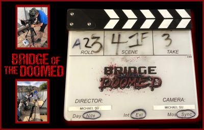 Bridge of the Doomed Filming Slate
A group of soldiers are ordered to hold a bridge during a zombie outbreak, but what lives underneath the bridge, proves to be even more deadly. The 2020 zombie film The Bridge of the Doomed was directed by Michael Su and this exact slate was used for the last three quarters of the film and can be seen in many behind the scenes pictures all the way until the final take was completed. 
Keywords: Bridge of the Doomed Filming Slate
