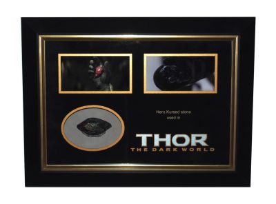 Hero Kursed Stone
When Dr Jane Foster gets cursed with a powerful object, Thor must protect it before an army and its ruthless leader try to get their hands on it to take over the remains of Earth. This is a hero light-up version of the Kursed Stone used in the 2013 Marvel film, Thor: The Dark World. This special stone is used by elite Dark Elves to improve their physical capabilities beyond a normal Dark Elf at the cost of a certain death several hours after the transformation. Upon the transformation, Dark Elves naturally possess above-human strength by crushing the Kursed Stone in their hand. The Dark Elf's clothes and armor merge with their skin; they grow in size and their physical strength and durability increase massively. During their final battle against Asgard, some of the Dark Elves utilized these stones to become Kursed for a short time while becoming "super soldiers" overwhelmed Asgard's forces, but were eventually killed by the latter's superior numbers. 5000 years later, Algrim, Malekith's lieutenant, used the last Kursed Stone to become the last of the Kursed. This Kursed Stone still has the switch present allowing it to be turned on and lighting with a red glow as though the stone has been activated.
Keywords: Hero Kursed Stone