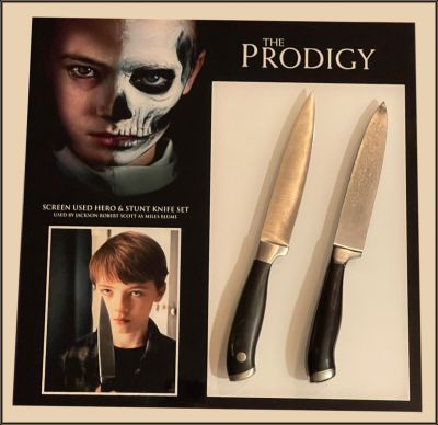 Miles Blume's Hero and Stunt Knives
A mother concerned about her young son's disturbing behavior thinks something supernatural may be affecting him. From the 2019 horror film The Prodigy, these are the hero and stunt knives that Miles Blume (Jackson Robert Scott) used during the scene when Miles enters and brutally attacks Margaret with a butcher knife, stabbing and disemboweling her. One of the knives is made of metal and sharp while the other is made of rubber and wouldâ€™ve been used when close with others for safety.
Keywords: Miles Blume's Hero and Stunt Knives