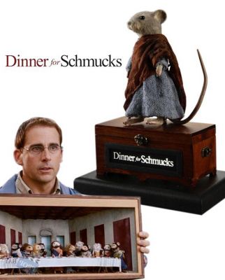 "Last Supper" Mouse
A "Last Supper" Mouse Display from the 2010 Jay Roach comedy, Dinner for Schmucks. In the film, financial executive Tim Conrad (Paul Rudd) must impresses his boss Lance Fender (Bruce Greenwood) at a dinner party where he is required to present a 'schmuck' of his choice, to be ridiculed by the teams financial elite. Tim decides to bring along bizarre taxidermist Barry (Steve Carrell) who creates stunning art with dead mice. This particular mouse was made for the Last Supper diorama, however it was unused in the final display. It wears a light blue woven tunic with an amber colored silk shawl worn over the shoulder. Made from fur-covered urethane, the mice in the film were designed and created by the Chiodo brothers, along with a team of talented artisans. It stands on a small wooden chest that features the film's title on front, which illuminates by pressing a button in the back. 

Keywords: "Last Supper" Mouse