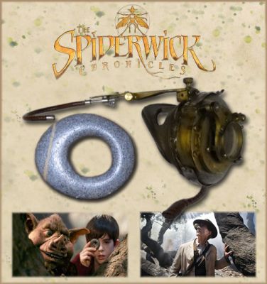 Arthur Spiderwick's Hero Eye Glass and Seeing Stone
The Spiderwick Chronicles is a 2008 fantasy film adaptation of bestselling series of the same name. Set in the Spiderwick Estate; it follows the adventures of Jared Grace and his family as they discover Arthur Spiderwick's field guide to faeries, goblins, and other magical creatures. This is the only known hero eye glass kept after filming along with a hero seeing stone. The eye glass actually opens to allow the characters in the film to insert the seeing stone which allowed them to see all the creatures. You can see the eye glass/stone throughout the film; mainly during the scenes when Simon gives his sister Mallory the eye glass to take with her on the trip with her brother Jared. While on the run the eye glass helped her see the Goblins easier without having to hold the stone while running to Woodhaven Sanatorium to speak with their Aunt Lucinda Spiderwick.
Keywords: Arthur Spiderwick's Hero Eye Glass and Seeing Stone