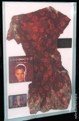 Eve's (Natasha Henstridge) "Hero" Bloody Dress
This dress was worn on screen by Natasha Henstridge as "Eve". This dress has the flower print, and is the bloody version that she wears after she escapes the containment cell and is shot several times.
Keywords: Eve's (Natasha Henstridge) "Hero" Bloody Dress
