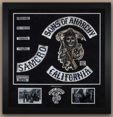 SAMCRO Patches
Single father Jax Teller finds his loyalty to his outlaw motorcycle club tested by his growing unease concerning the group's lawlessness, while the club protects and patrols the town of Charming, Calif. This is a set of screen used patches that have been removed from SAMCROâ€™s kuttes. Club members wear vests known as kuttes (jackets with the sleeves cut off). The SOA patch on the back is a Grim Reaper holding a crystal ball with the Anarchist circle-A symbol, and wielding the Reaper's traditional scythe, the handle of which has been replaced by the M16 rifle that the club's founders wielded in Vietnam. Only full members can wear the "patch." Other, smaller patches on the vest have specific meanings, such as "Men of Mayhem," which is worn by club members who have spilled blood on the club's behalf, â€œIn Memory of Opieâ€ which was a patch worn in tribute for Jaxâ€™s best friend Opie, and President.
Keywords: SAMCRO Patches